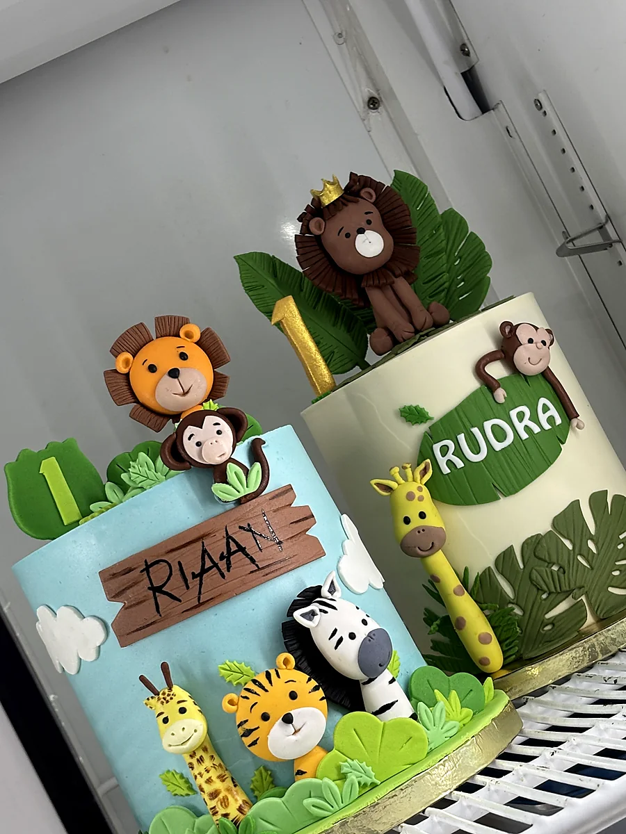 Jungle theme first birthday cakes