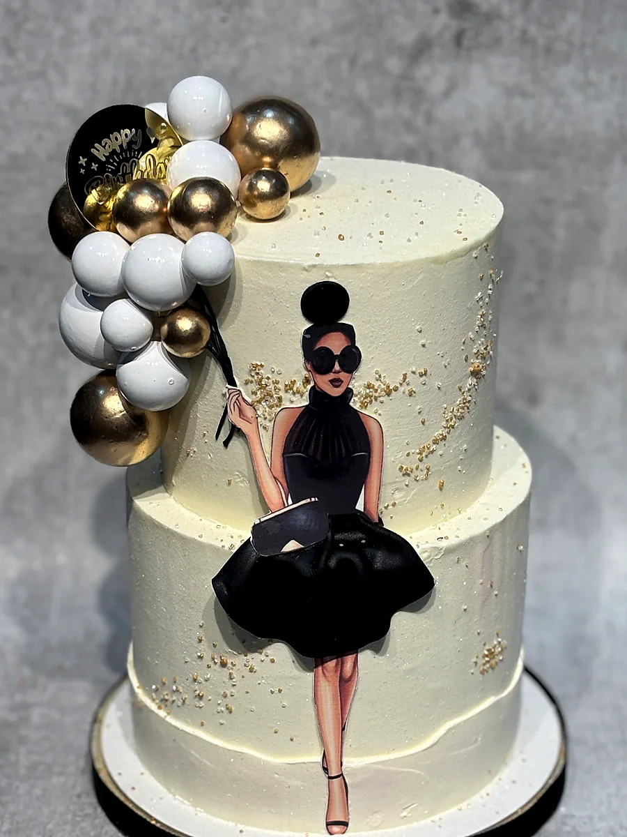 Two-tier gold balloon fashion cake