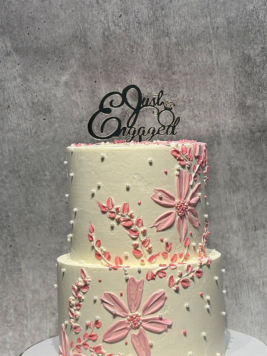Just Engaged two-tier floral cake
